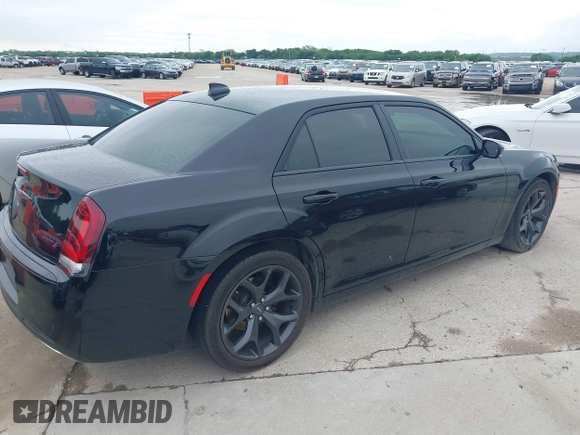 2021 Chrysler 300 with VIN 2C3CCABG8MH524121, listed as a IAAI auction lot 42119886 with 84,593 mi miles. Bid and sale history available at carsss.com. Image 4.