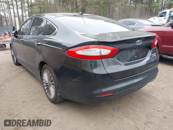 2013 Ford Fusion Titanium Hybrid with VIN 3FA6P0RU2DR281905, listed as a IAAI auction lot 41765130 with 119,348 mi miles. Bid and sale history available at carsss.com. Image 3.