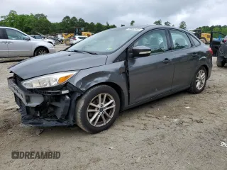 2015 Ford Focus SE z VIN 1FADP3F23FL290089, wystawiony jako Copart lot #59952905 z przebiegiem 79 008 mil mil oraz Szkoda całkowita • Salvage title. Historia ofert i sprzedaży dostępna na DreamBid. Obrazek 1.