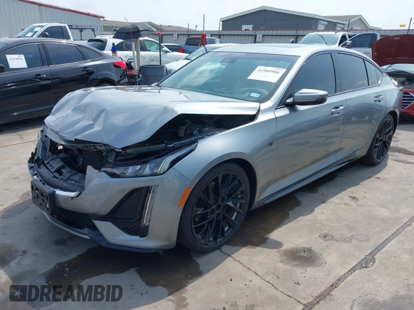 2023 Cadillac CT5 Sport z VIN 1G6DP5RK7P0113696, wystawiony jako IAAI lot #41904906 z przebiegiem 89 191 mil mil oraz . Historia ofert i sprzedaży dostępna na DreamBid. Obrazek 23.