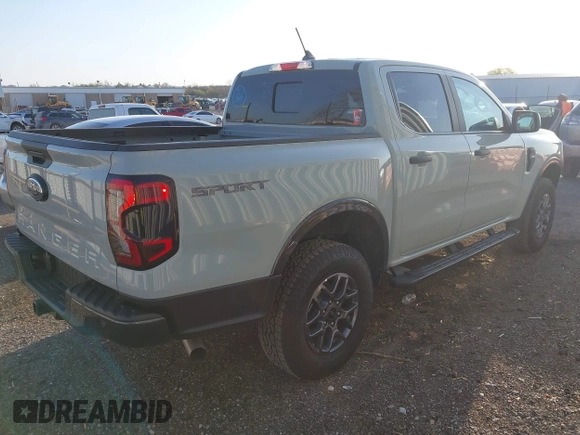 2024 Ford Ranger XLT with VIN 1FTER4GHXRLE59319, listed as a IAAI auction lot 41990936 with 1,002 mi miles and . Bid and sale history available at DreamBid. Image 4.