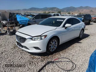2016 Mazda 6 i Sport with VIN JM1GJ1U53G1467358, listed as a Copart auction lot 60665565 with 111,061 mi miles and Salvage title. Bid and sale history available at DreamBid. Image 1.