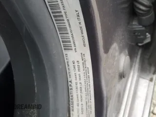 2016 Maserati Ghibli z VIN ZAM57XSA7G1168458, wystawiony jako Copart lot #43611465 z przebiegiem 98 110 mil mil oraz Szkody całkowita. Historia ofert i sprzedaży dostępna na DreamBid. Obrazek 12.