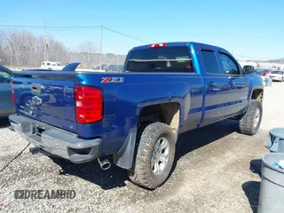2015 Chevrolet Silverado 1500 LT with VIN 1GCRCREC1FZ308160, listed as a IAAI auction lot 41650625 with 174,936 mi miles. Bid and sale history available at carsss.com. Image 4.