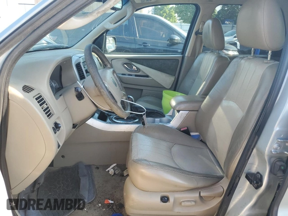 2005 Mercury Mariner Luxury z VIN 4M2CU57125DJ16694, wystawiony jako Copart lot #69063704 z przebiegiem 222 793 mil mil oraz Szkoda całkowita • Salvage title. Historia ofert i sprzedaży dostępna na DreamBid. Obrazek 7.