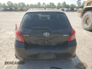 2008 Toyota Yaris with VIN JTDJT923285215823, listed as a Copart auction lot 53257895 with 184,400 mi miles and Salvage Title. Bid and sale history available at carsss.com. Image 6.