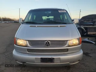 2003 Volkswagen EuroVan MV с VIN WV2MB47053H002505, выставлен на аукционе Copart как лот 83840884 с пробегом 250 786 миль миль и Чистый • Clean title. История ставок и продаж доступна на DreamBid. Изображение 5.
