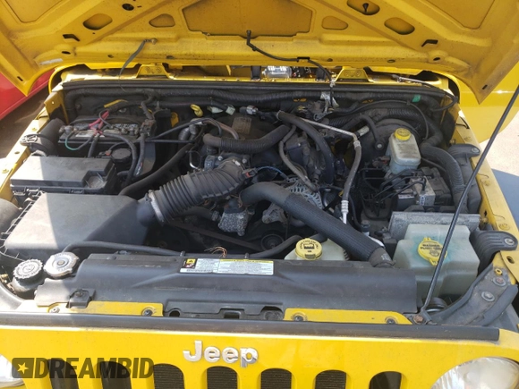 2007 Jeep Wrangler X z VIN 1J4GA39107L229841, wystawiony jako Copart lot #59998895 z przebiegiem 191 089 mil mil oraz Czysty tytuł • Clean title. Historia ofert i sprzedaży dostępna na DreamBid. Obrazek 11.