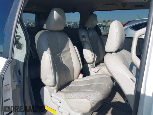 2012 Toyota Sienna XLE AAS z VIN 5TDYK3DC5CS218522, wystawiony jako IAAI lot #42605170 z przebiegiem 236 508 mil mil oraz . Historia ofert i sprzedaży dostępna na DreamBid. Obrazek 8.