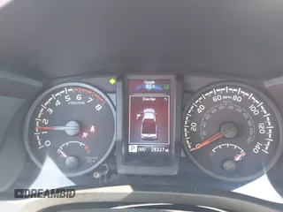 2021 Toyota Tacoma SR with VIN 3TYRX5GN8MT013815, listed as a IAAI auction lot 42311783 with 28,327 mi miles and . Bid and sale history available at DreamBid. Image 7.