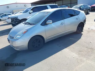 2005 Toyota Prius z VIN JTDKB20UX53080527, wystawiony jako IAAI lot #41831153 z przebiegiem 256 327 mil mil oraz . Historia ofert i sprzedaży dostępna na DreamBid. Obrazek 18.