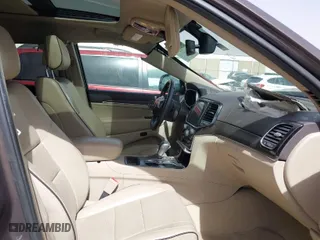 2020 Jeep Grand Cherokee Overland with VIN 1C4RJECG8LC323824, listed as a IAAI auction lot 41757922 with 64,792 mi miles. Bid and sale history available at carsss.com. Image 5.