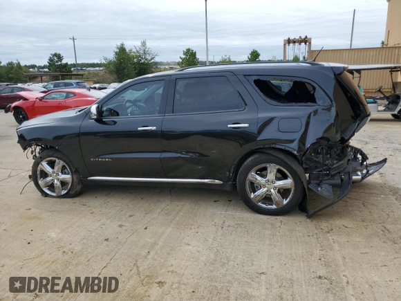 2012 Dodge Durango Citadel with VIN 1C4RDHEG7CC247504, listed as a Copart auction lot 70443154 with 115,888 mi miles and Salvage title. Bid and sale history available at DreamBid. Image 2.