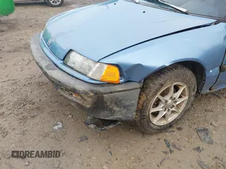 1991 Honda Civic z VIN 2HGED634XMH576080, wystawiony jako IAAI lot #42126557 z przebiegiem 271 729 mil mil oraz . Historia ofert i sprzedaży dostępna na DreamBid. Obrazek 6.