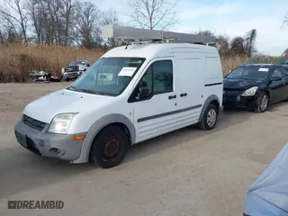 2013 Ford Transit Connect XL with VIN NM0LS7CN1DT163863, listed as a IAAI auction lot 41614242 with 182,454 mi miles. Bid and sale history available at carsss.com. Image 2.