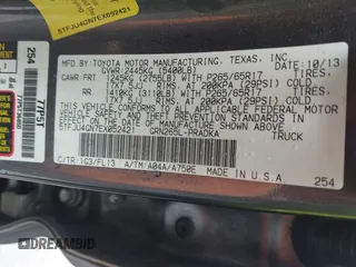 2014 Toyota Tacoma PreRunner with VIN 5TFJU4GN7EX052421, listed as a IAAI auction lot 42360951 with 166,175 mi miles and . Bid and sale history available at DreamBid. Image 9.
