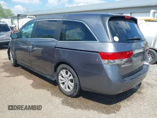 2014 Honda Odyssey EX-L with VIN 5FNRL5H60EB117218, listed as a IAAI auction lot 42201739 with 184,586 mi miles and . Bid and sale history available at DreamBid. Image 3.
