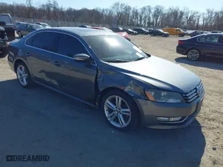 2013 Volkswagen Passat SE w/Sunroof with VIN 1VWBM7A30DC125919, listed as a IAAI auction lot 41759051 with 112,952 mi miles. Bid and sale history available at carsss.com. Image 1.