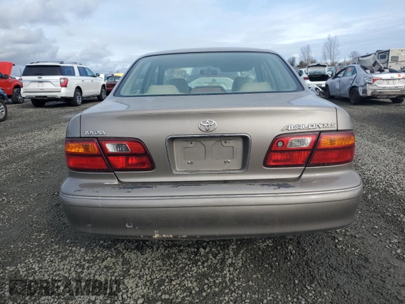 1998 Toyota Avalon XL with VIN 4T1BF18B0WU284522, listed as a Copart auction lot 45590925 with 278,690 mi miles and Salvage Title. Bid and sale history available at DreamBid. Image 6.