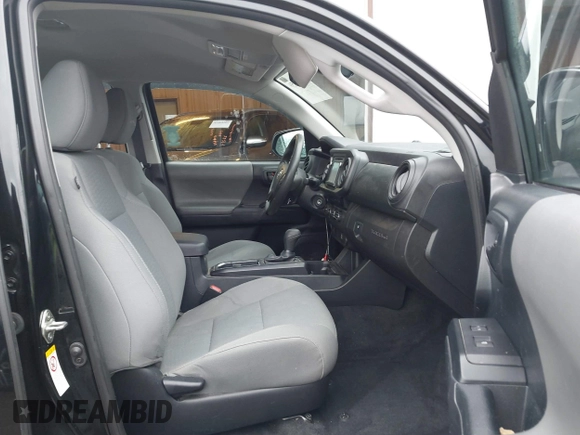 2018 Toyota Tacoma SR with VIN 3TMCZ5AN3JM184455, listed as a IAAI auction lot 41446859 with 44,187 mi miles and . Bid and sale history available at DreamBid. Image 5.