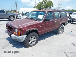 2000 Jeep Cherokee z VIN 1J4FF48S7YL129654, wystawiony jako IAAI lot #42201026 z przebiegiem 272 922 mil mil oraz . Historia ofert i sprzedaży dostępna na DreamBid. Obrazek 2.