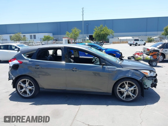 2015 Ford Focus Titanium with VIN 1FADP3N27FL380525, listed as a IAAI auction lot 42493542 with 86,423 mi miles and . Bid and sale history available at DreamBid. Image 14.