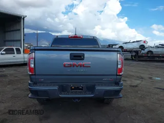 2021 GMC Canyon 4WD AT4 z VIN 1GTG6FEN8M1275345, wystawiony jako IAAI lot #42045878 z przebiegiem 68 299 mil mil oraz . Historia ofert i sprzedaży dostępna na DreamBid. Obrazek 16.