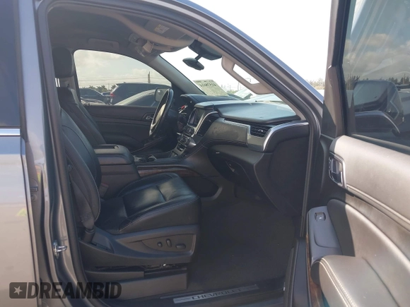 2020 Chevrolet Suburban LT z VIN 1GNSCHKC8LR157188, wystawiony jako IAAI lot #41578614 z przebiegiem 82 566 mil mil oraz . Historia ofert i sprzedaży dostępna na DreamBid. Obrazek 5.