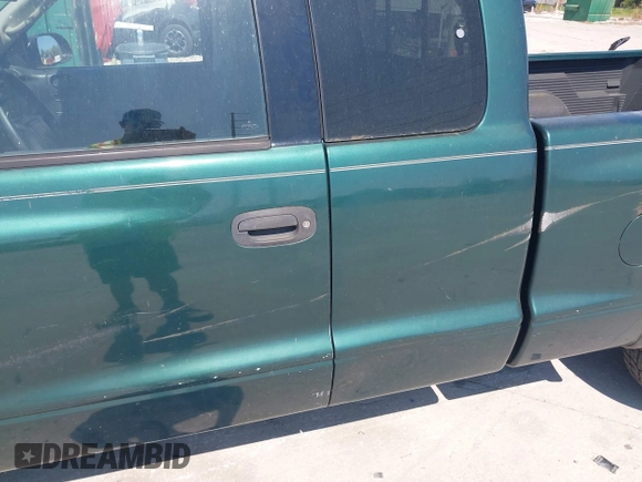 2002 Dodge Dakota with VIN 1B7GL12X32S619222, listed as a IAAI auction lot 41793106 with 97,649 mi miles and . Bid and sale history available at carsss.com. Image 14.