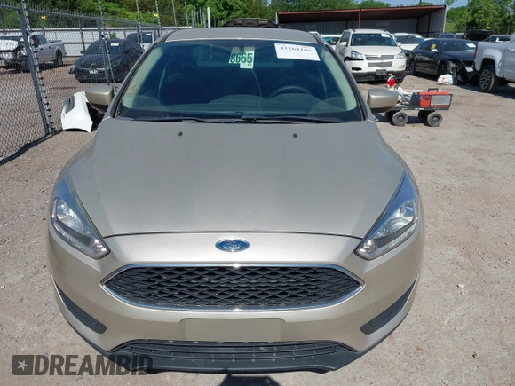 2018 Ford Focus SE z VIN 1FADP3FEXJL210905, wystawiony jako IAAI lot #42264105 z przebiegiem 136 499 mil mil oraz . Historia ofert i sprzedaży dostępna na DreamBid. Obrazek 12.