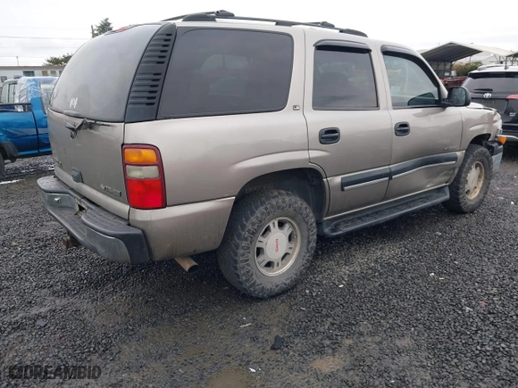 2001 Chevrolet Tahoe LS with VIN 1GNEK13T11R109826, listed as a IAAI auction lot 41473357 with 257,335 mi miles. Bid and sale history available at carsss.com. Image 4.