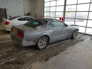 2007 Ford Mustang Deluxe with VIN 1ZVFT84N075276744, listed as a IAAI auction lot 41559826 with 145,129 mi miles and . Bid and sale history available at carsss.com. Image 4.