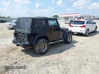 2002 Jeep Wrangler Sport with VIN 1J4FA49S32P700831, listed as a IAAI auction lot 42626269 with 182,870 mi miles and . Bid and sale history available at DreamBid. Image 4.