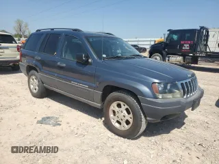 2003 Jeep Grand Cherokee Laredo with VIN 1J4GX48S83C504543, listed as a Copart auction lot 52723835 with 220,574 mi miles and Clean Title. Bid and sale history available at carsss.com. Image 4.