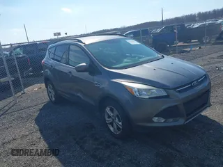 2014 Ford Escape SE with VIN 1FMCU9G98EUD26411, listed as a IAAI auction lot 41686493 with 132,644 mi miles. Bid and sale history available at carsss.com. Image 1.