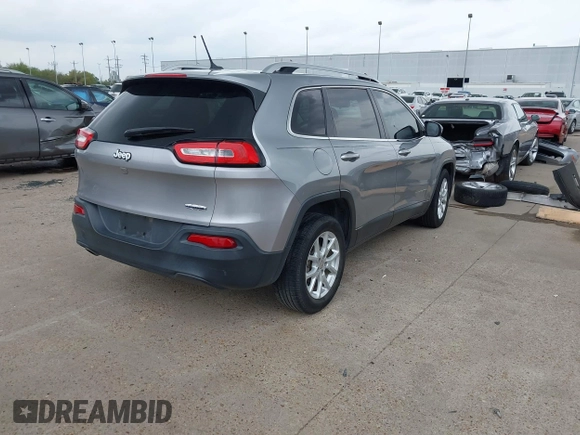 2016 Jeep Cherokee 75th Anniversary with VIN 1C4PJLCB1GW229823, listed as a IAAI auction lot 41848844 with 94,884 mi miles. Bid and sale history available at carsss.com. Image 4.