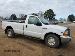 2001 Ford F-250 XL with VIN 1FTNF20L61EB61984, listed as a Copart auction lot 41397135 with 156,815 mi miles and Salvage title. Bid and sale history available at DreamBid. Image 4.