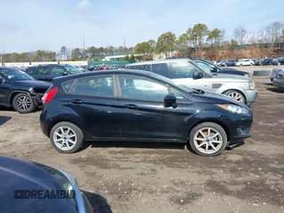 2019 Ford Fiesta SE with VIN 3FADP4EJ0KM136804, listed as a IAAI auction lot 41657106 with 999,999 mi miles. Bid and sale history available at carsss.com. Image 12.