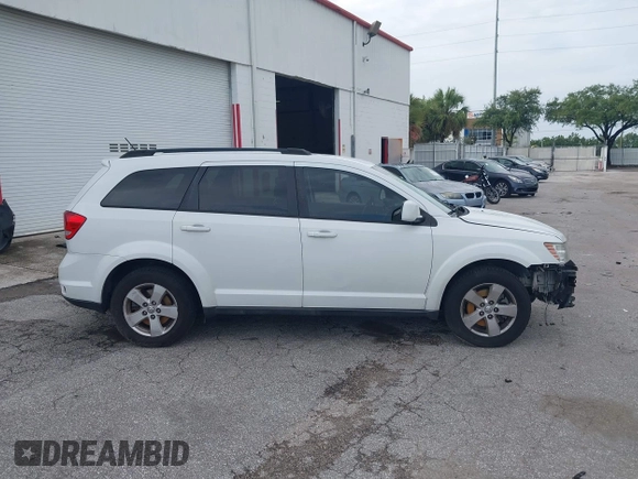 2012 Dodge Journey SXT with VIN 3C4PDCBG3CT331693, listed as a IAAI auction lot 42624751 with 165,480 mi miles and . Bid and sale history available at DreamBid. Image 14.