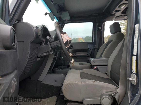 2008 Jeep Wrangler Unlimited X with VIN 1J4GB39138L602949, listed as a Copart auction lot 78503934 with 181,023 mi miles and Salvage Title. Bid and sale history available at DreamBid. Image 7.