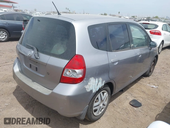 2007 Honda Fit z VIN JHMGD38467S063046, wystawiony jako IAAI lot #42238007 z przebiegiem 171 743 mil mil oraz . Historia ofert i sprzedaży dostępna na DreamBid. Obrazek 4.