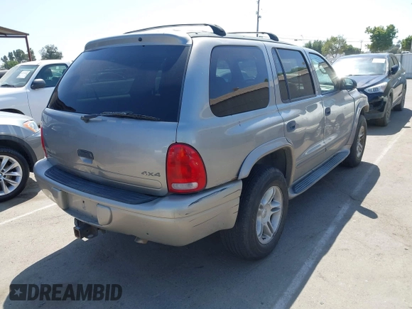 2000 Dodge Durango with VIN 1B4HS28Z0YF244622, listed as a IAAI auction lot 42383817 with 216,543 mi miles and . Bid and sale history available at DreamBid. Image 4.