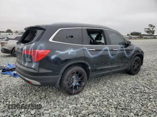 2017 Honda Pilot Elite with VIN 5FNYF6H0XHB019211, listed as a Copart auction lot 62426475 with 69,205 mi miles and Salvage title. Bid and sale history available at DreamBid. Image 3.