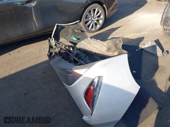 2022 Toyota Prius LE z VIN JTDKAMFP8N3211485, wystawiony jako IAAI lot #42515220 z przebiegiem 23 875 mil mil oraz . Historia ofert i sprzedaży dostępna na DreamBid. Obrazek 12.