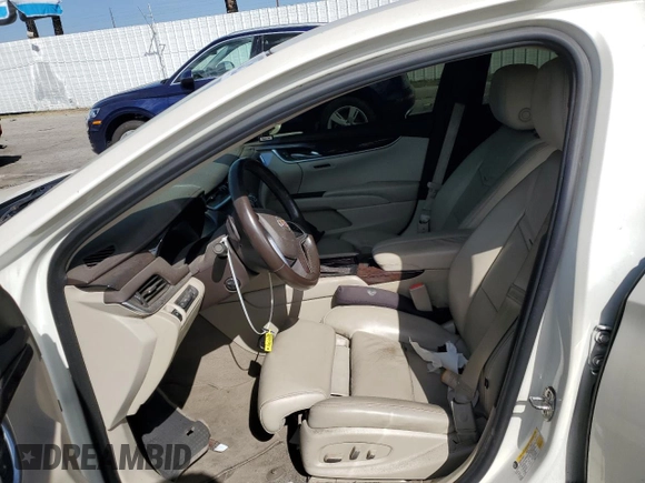 2014 Cadillac XTS Premium with VIN 2G61P5S36E9305491, listed as a Copart auction lot 44404425 with 104,710 mi miles and Salvage Title. Bid and sale history available at DreamBid. Image 7.