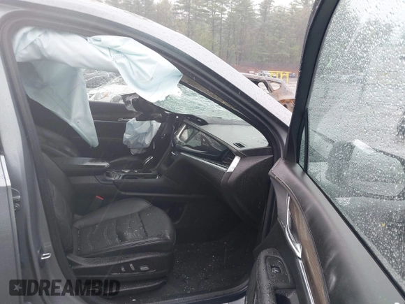 2023 Cadillac XT6 AWD Sport with VIN 1GYKPHRS2PZ179987, listed as a IAAI auction lot 42169973 with 20,623 mi miles and . Bid and sale history available at DreamBid. Image 5.