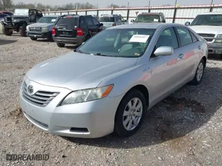 2007 Toyota Camry Hybrid with VIN JTNBB46K473000672, listed as a IAAI auction lot 41841447 with 216,474 mi miles. Bid and sale history available at carsss.com. Image 2.