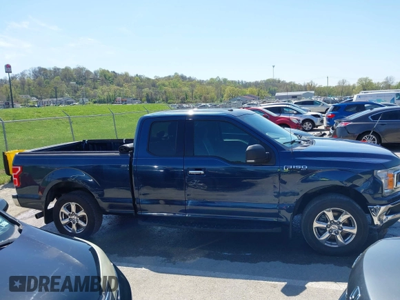 2018 Ford F-150 XL z VIN 1FTEX1CP6JFE07304, wystawiony jako IAAI lot #41984097 z przebiegiem 100 658 mil mil oraz . Historia ofert i sprzedaży dostępna na DreamBid. Obrazek 13.