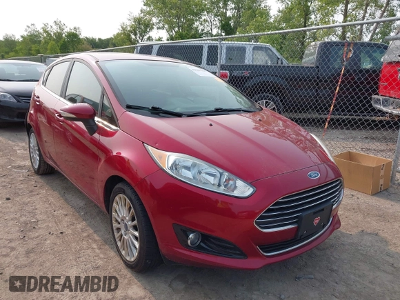 2015 Ford Fiesta Titanium z VIN 3FADP4FJ1FM171680, wystawiony jako IAAI lot #42383105 z przebiegiem 51 396 mil mil oraz . Historia ofert i sprzedaży dostępna na DreamBid. Obrazek 1.