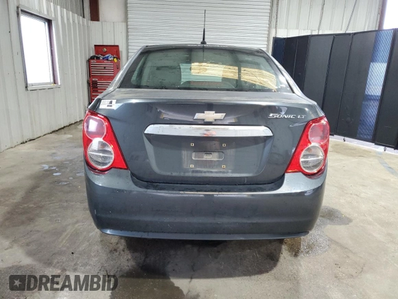 2014 Chevrolet Sonic LT z VIN 1G1JC5SH1E4118997, wystawiony jako Copart lot #70792334 z przebiegiem 166 691 mil mil oraz Szkoda całkowita • Salvage title. Historia ofert i sprzedaży dostępna na DreamBid. Obrazek 6.